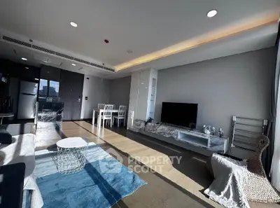 Spacious modern living room with sleek design and abundant natural light