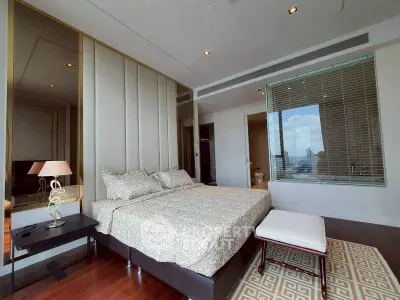 Luxurious bedroom with elegant decor and city view window