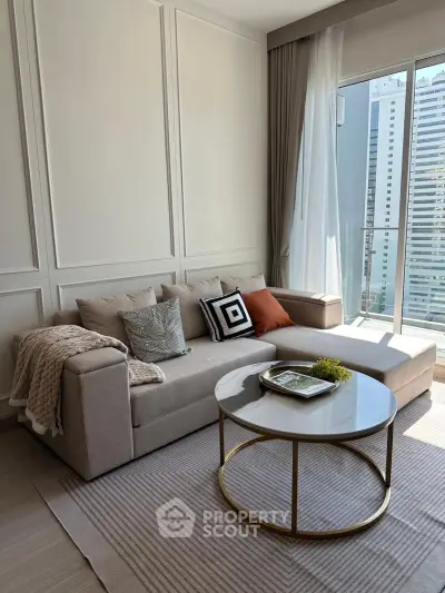Modern living room with stylish sofa and city view through large window