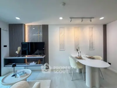 Modern living room with elegant dining area and stylish decor