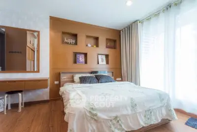 Cozy bedroom with wooden accents and natural light