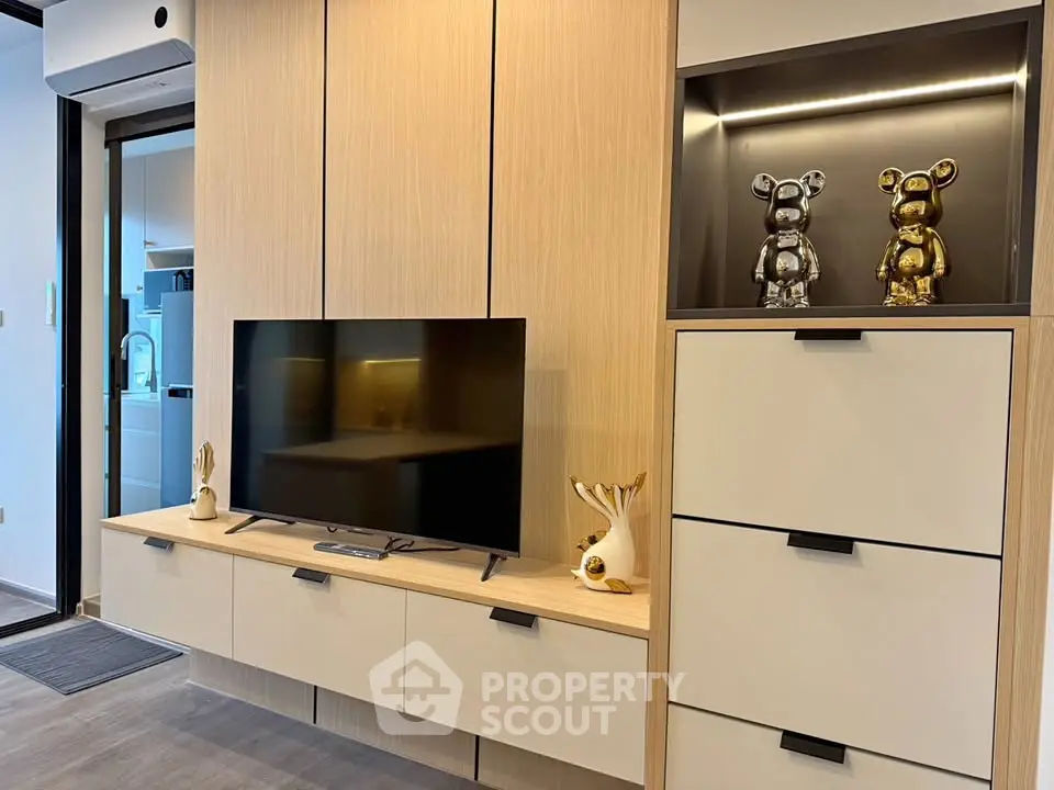 Modern living room with stylish TV unit and decorative accents