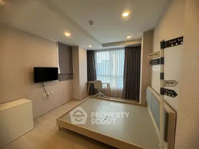 Modern bedroom with minimalist decor and city-themed wall signs