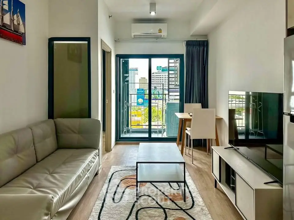 Modern living room with balcony view in urban apartment