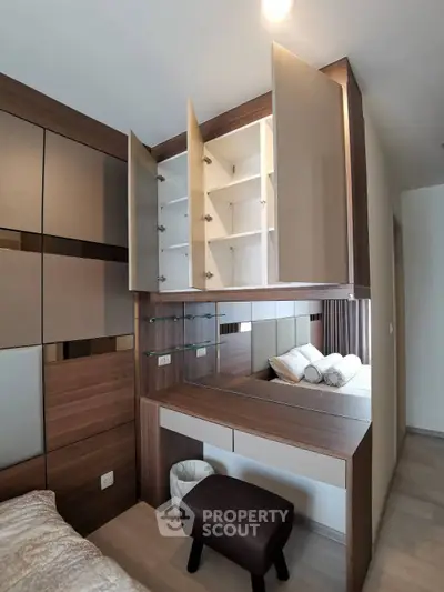 Modern bedroom with stylish storage and elegant decor