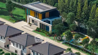 Luxurious modern villa with solar panels and lush garden in upscale neighborhood.