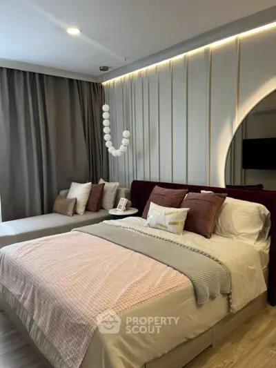 Luxurious bedroom with modern decor and ambient lighting