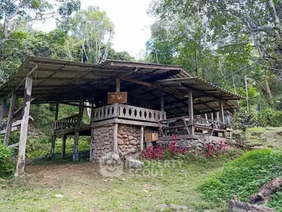 Charming rustic cabin nestled in lush greenery, perfect for nature lovers seeking tranquility.