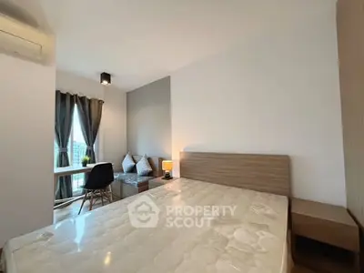 Modern bedroom with large window and stylish decor