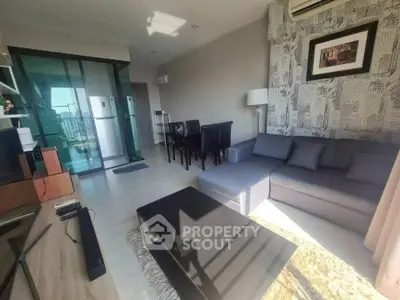 Modern living room with stylish decor and ample natural light