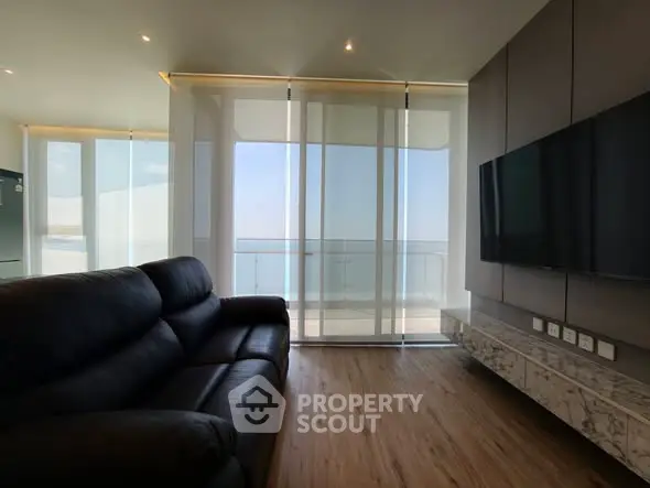 Luxurious living room with ocean view and modern decor