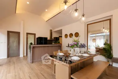 Modern dining area with elegant decor and open kitchen layout