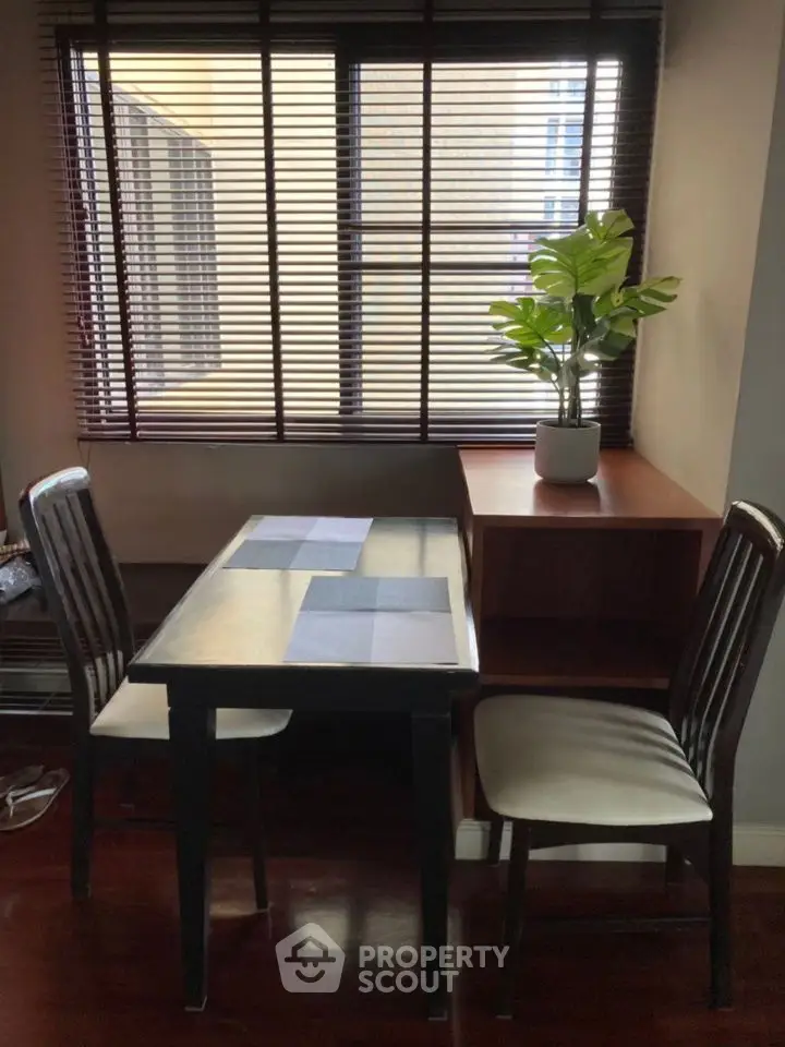 Cozy dining nook with natural light and stylish decor