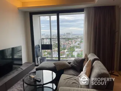 Modern living room with stunning city view from high-rise balcony