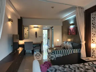Spacious living room with modern decor and cozy seating area, perfect for relaxation and entertainment.