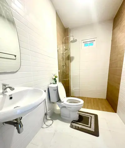 Modern bathroom with sleek fixtures and walk-in shower