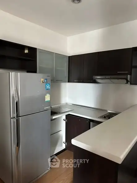 Modern kitchen with sleek cabinets and stainless steel appliances