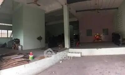 Spacious interior with potential for customization, featuring open layout and high ceilings.