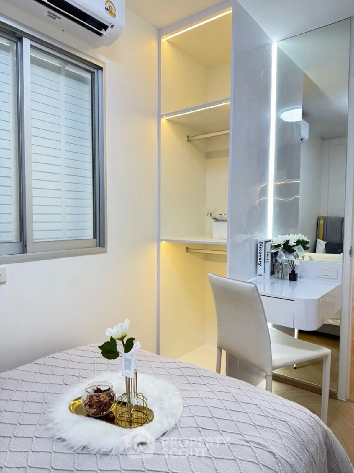 Modern bedroom with elegant decor and built-in wardrobe