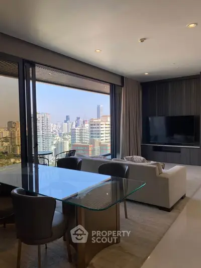 Luxurious living room with stunning city view and modern furnishings