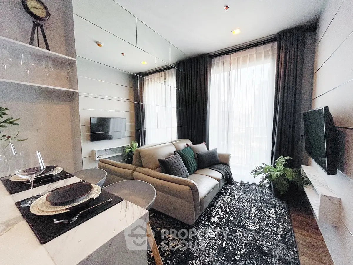 Modern living room with stylish decor and large windows for natural light