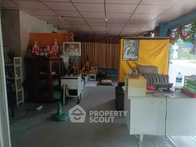 Cozy living space with eclectic decor and natural light