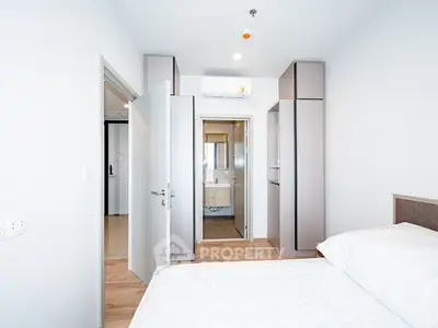 Modern bedroom with ensuite bathroom and minimalist design