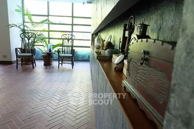 Stylish living room with herringbone floor and large windows