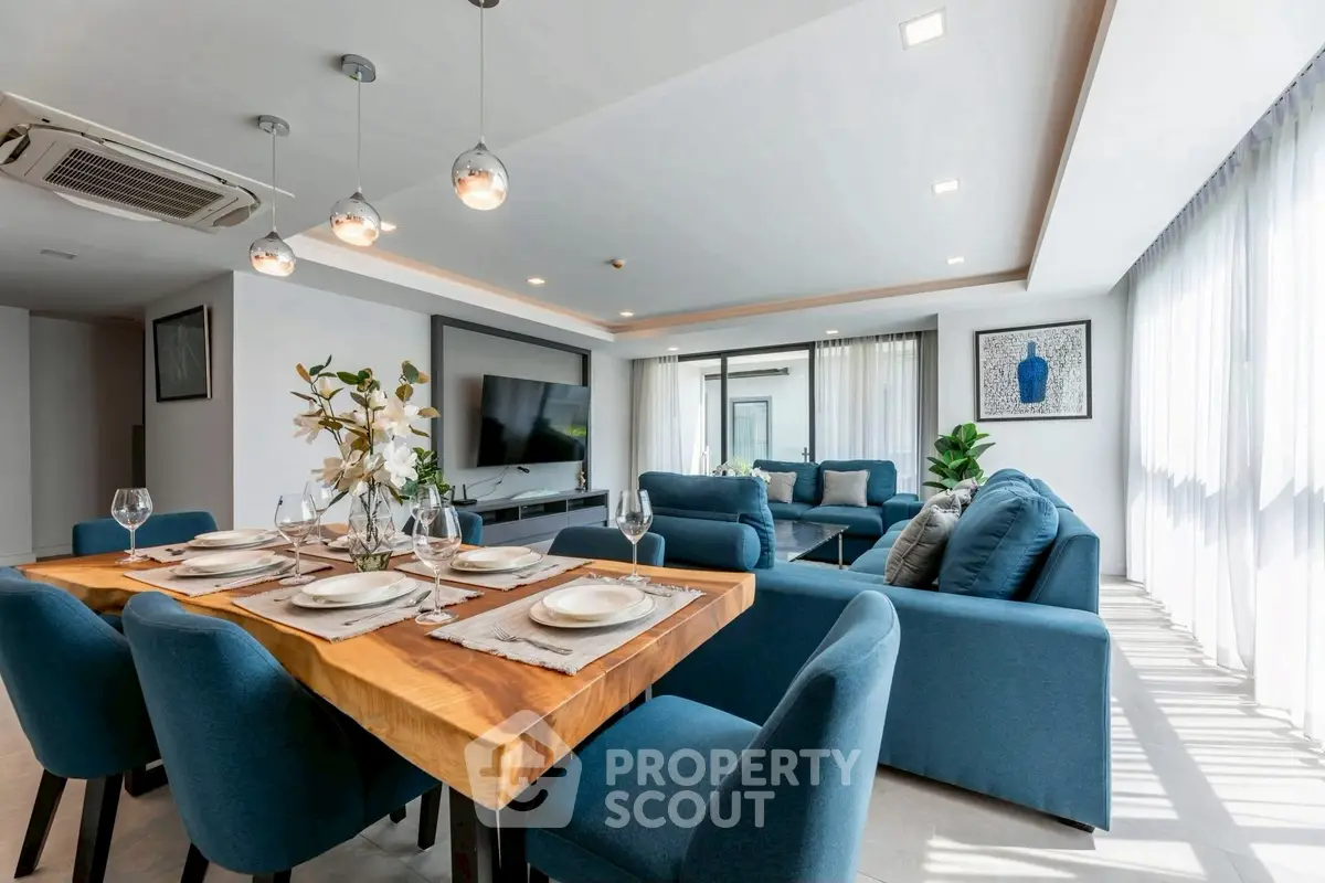 Luxurious modern living room with elegant dining area and stylish decor