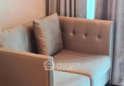 Elegant modern living room with stylish beige sofa and luxurious curtains