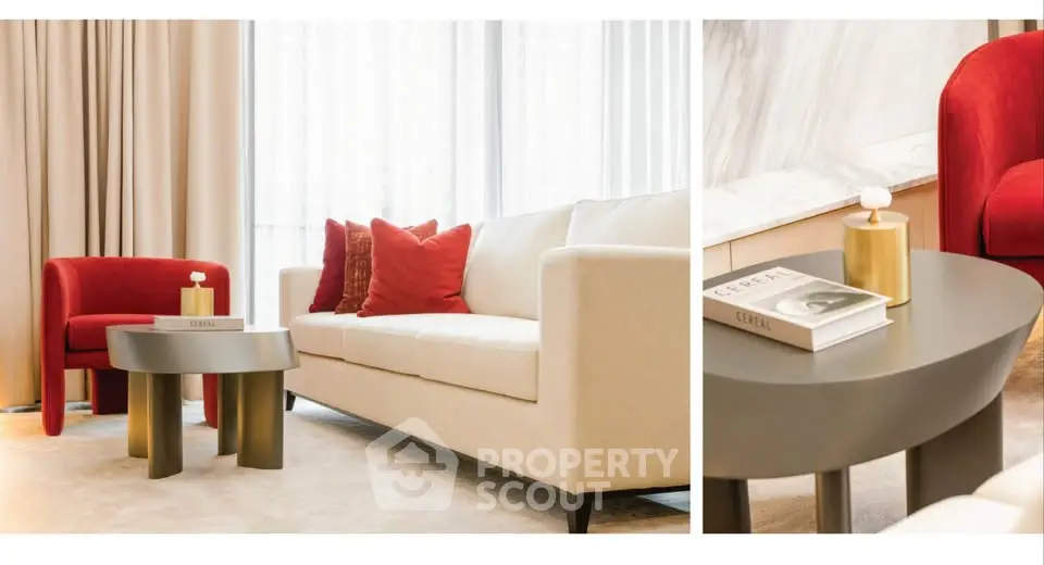 Luxurious living room with elegant white sofa, vibrant red armchair, and stylish coffee table in modern apartment.