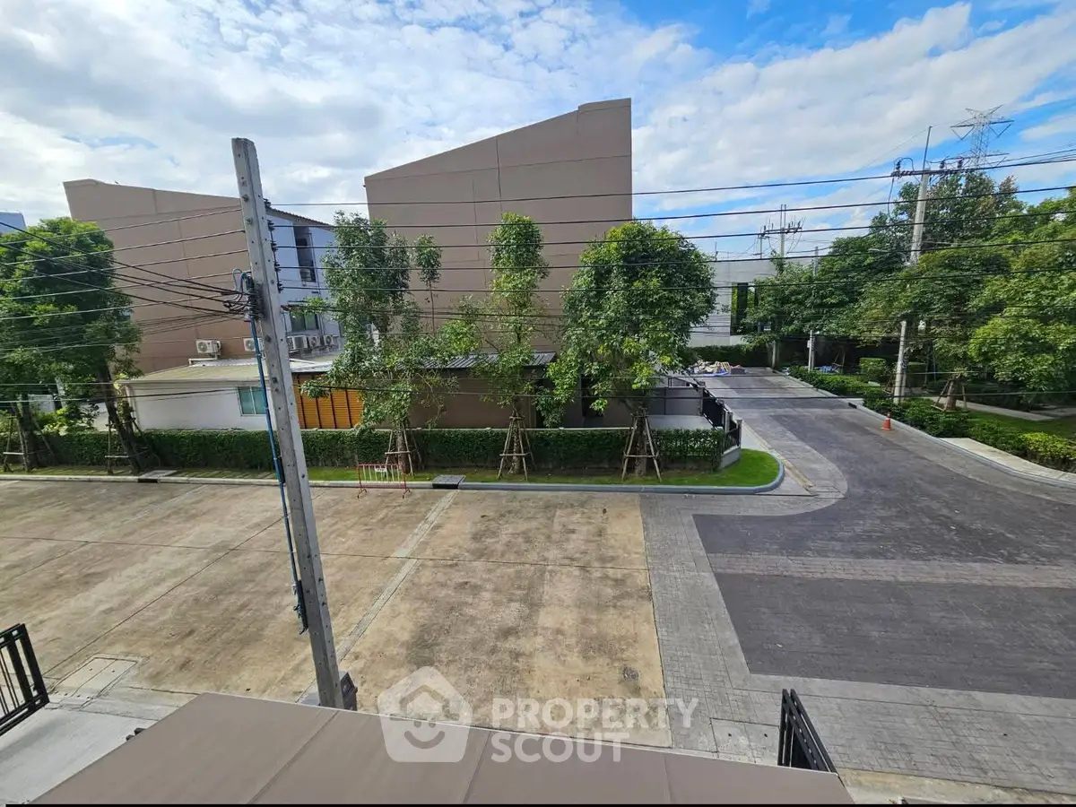 Spacious residential area with lush greenery and modern architecture