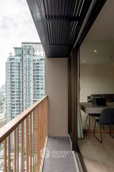 Modern apartment balcony with city view and stylish interior design
