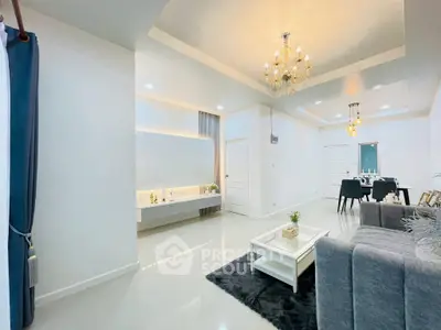 Elegant living room with chandelier and modern decor