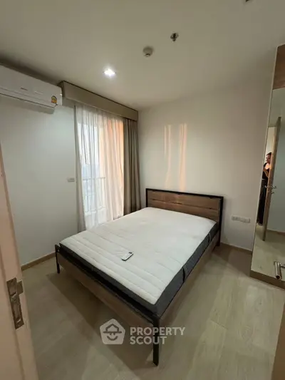 Modern bedroom with minimalist design and natural light