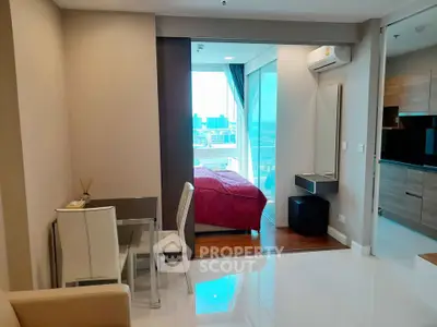 Modern studio apartment with city view and stylish interior design