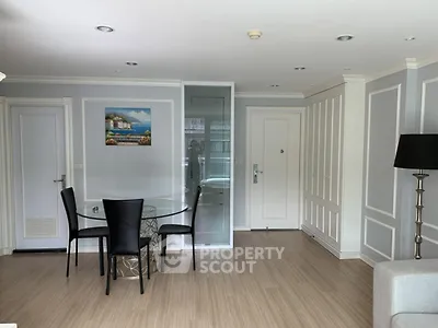 Spacious modern living room with elegant dining area and stylish decor