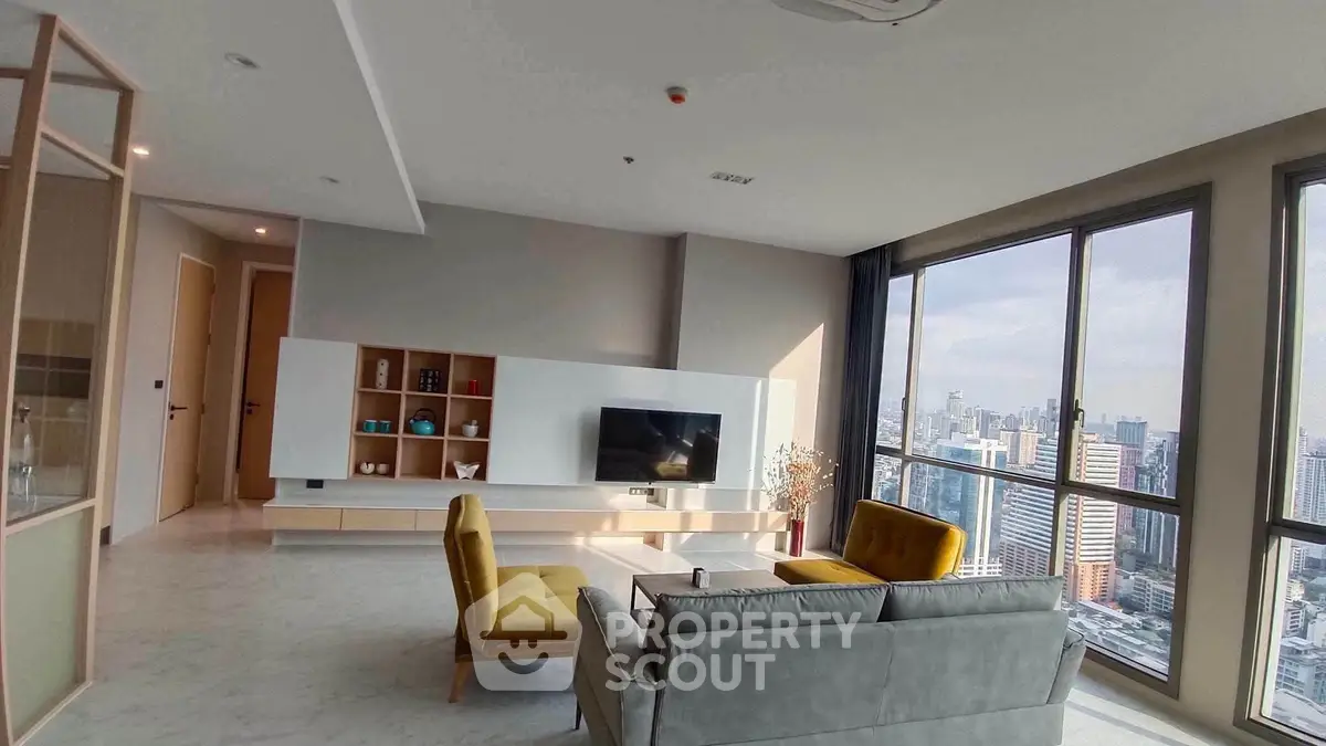 Modern living room with panoramic city view and stylish furniture