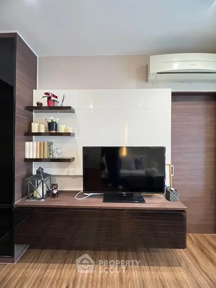 Modern living room with sleek TV unit and stylish decor