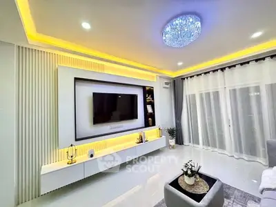 Modern living room with sleek design and ambient lighting