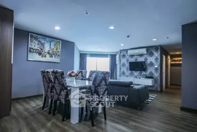 Spacious modern living room with elegant dining area and stylish decor