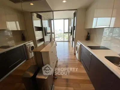 Spacious modern living room with large windows and city view