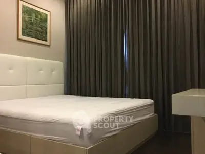 Cozy bedroom with elegant curtains and modern decor