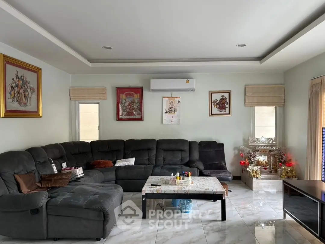 Spacious living room with modern sectional sofa and elegant decor