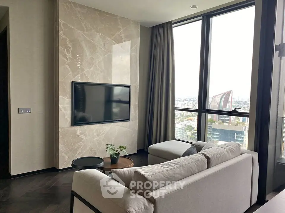 Luxurious modern living room with large windows and stunning city view