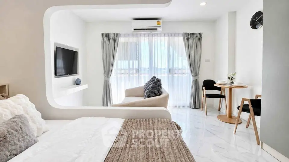 Modern studio apartment with stylish decor and natural light