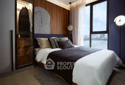 Modern bedroom with stylish decor and large window offering stunning city view.