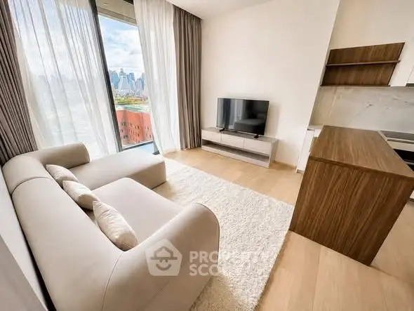 Modern living room with city view, featuring sleek furniture and natural light.