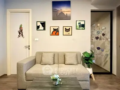 Chic living room with modern decor and cozy sofa, perfect for relaxation and style.