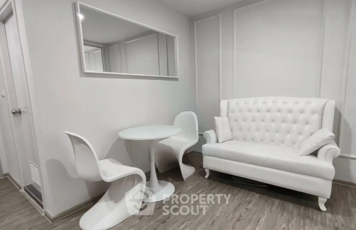 Chic modern living room with elegant white furniture and stylish decor